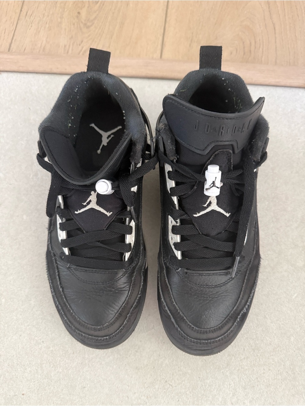 Jordan Kids' Black and White High-Top Sneakers